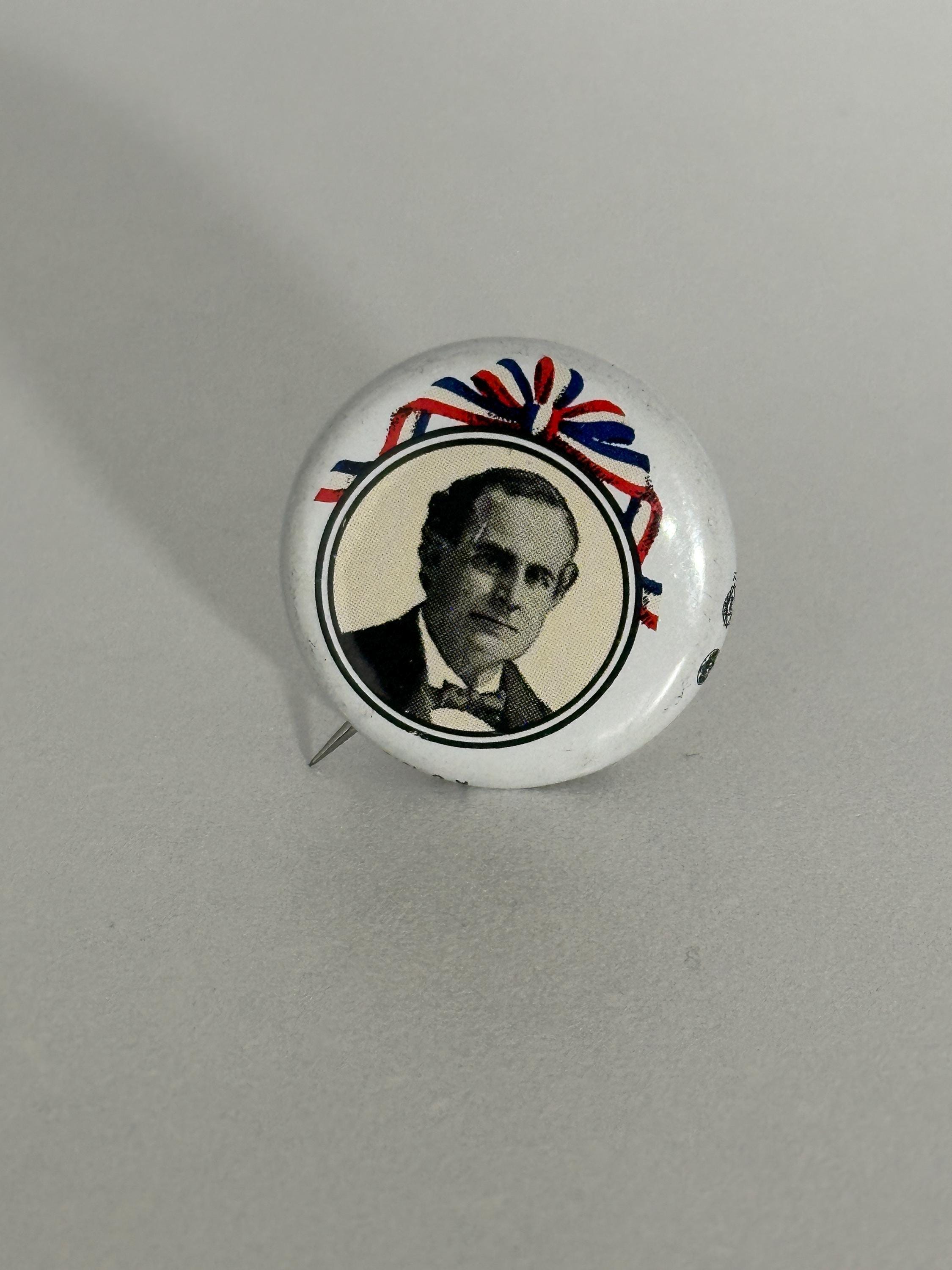 Vintage Political Campaign Pin: Black & White Portrait with Patriotic Ribbon - Early 20th Century Accessory