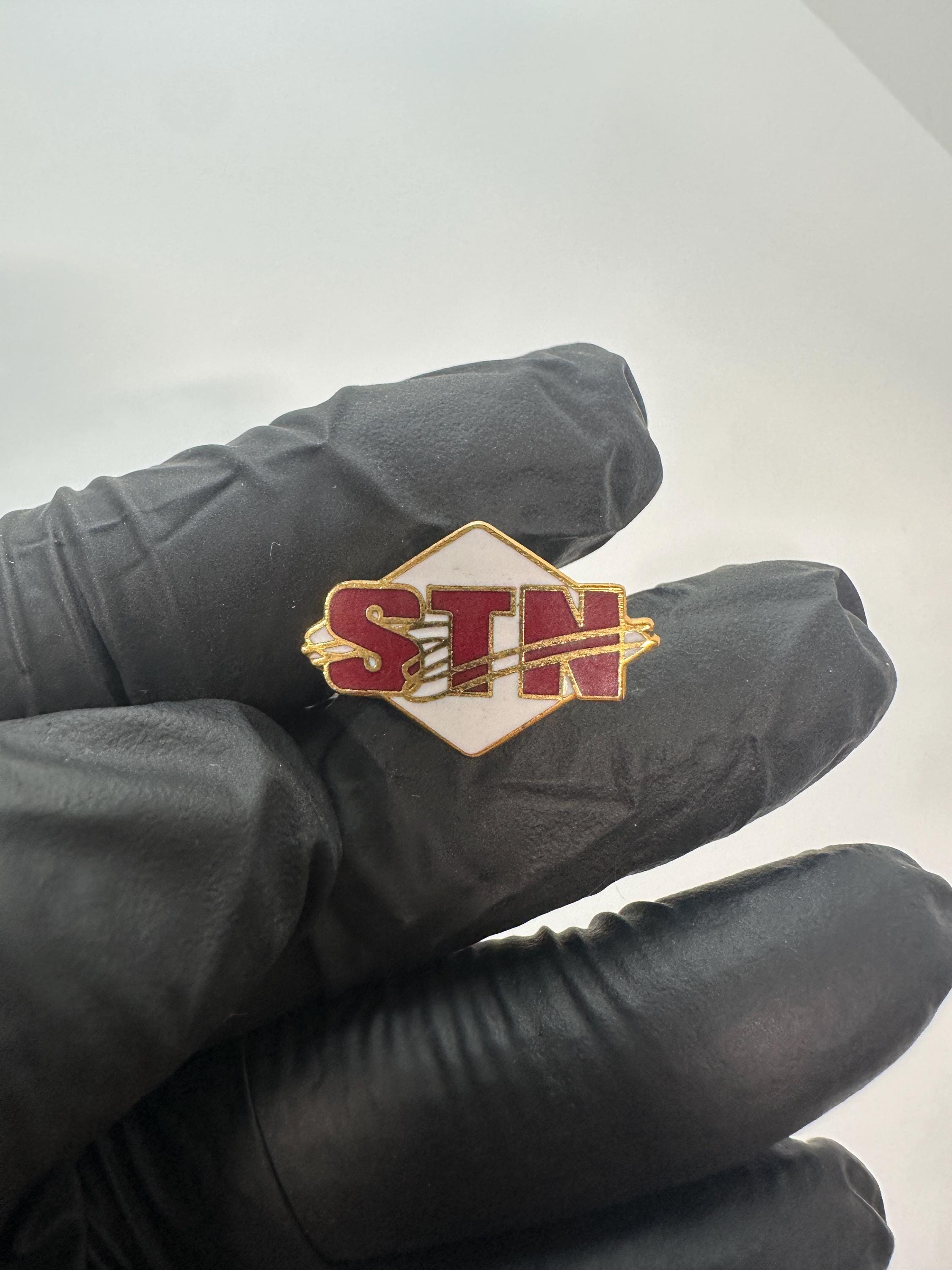 STN Logo Enamel Pin: Red & Gold Finish - Vintage Collectible Accessory
