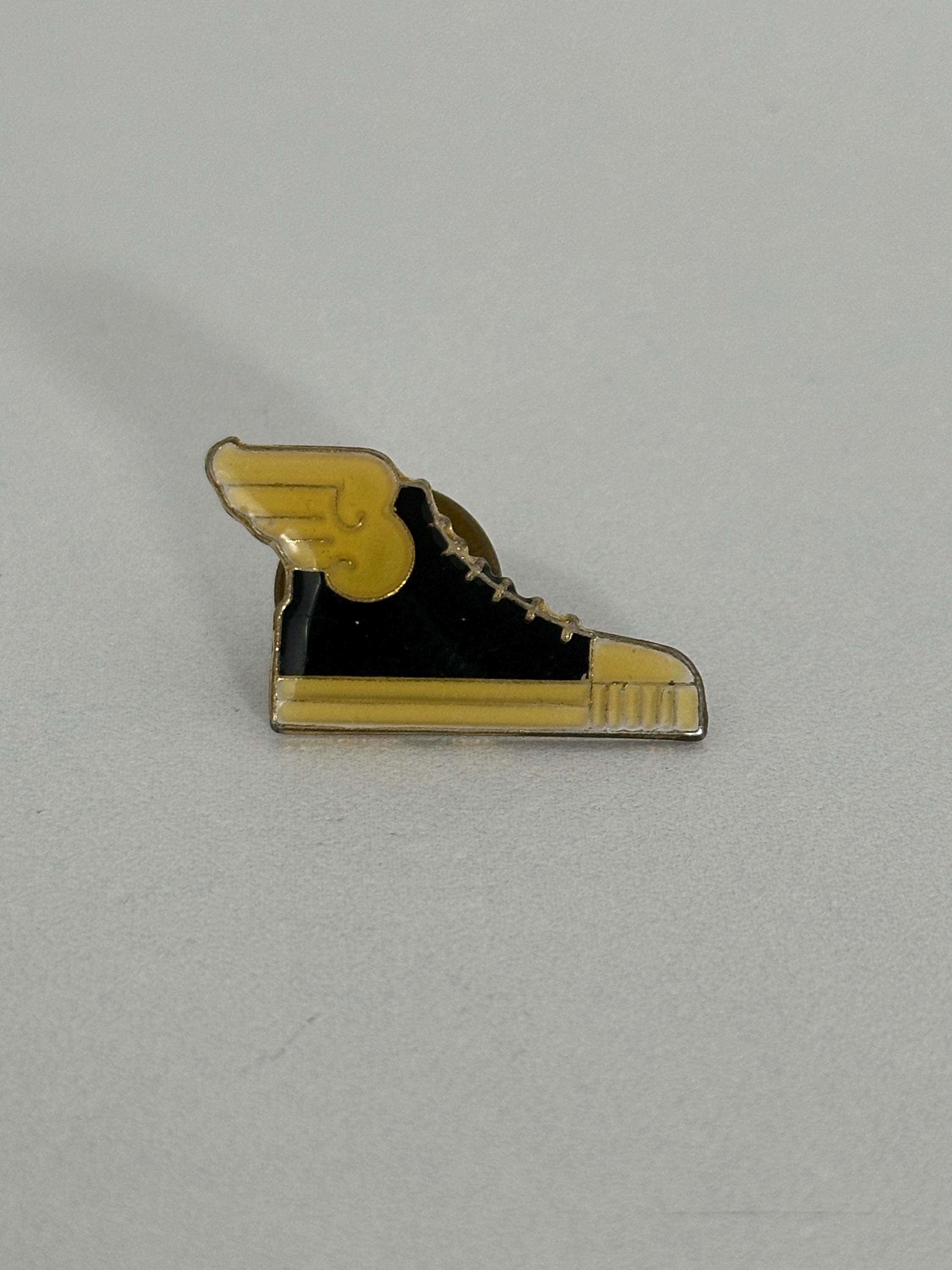 Winged Sneaker Enamel Pin: Black & Yellow Finish - Retro Style Accessory
