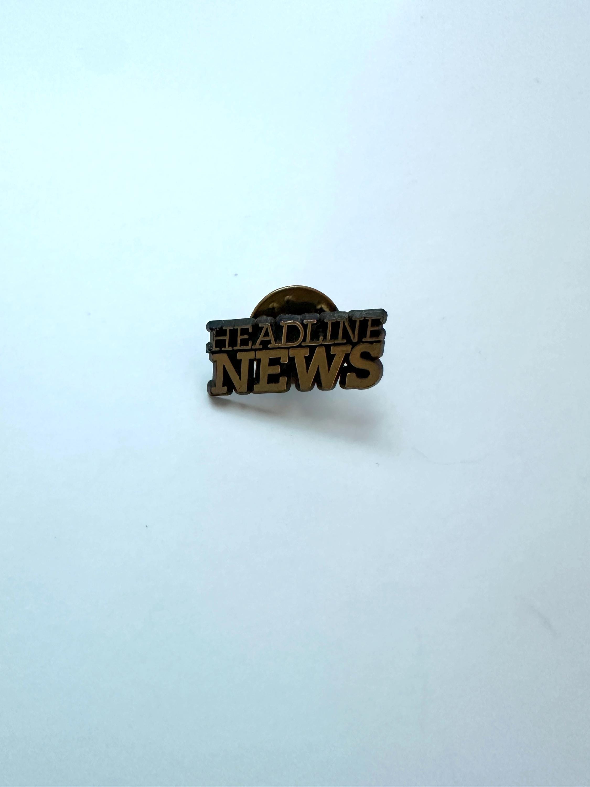 Vintage Headline News Logo Pin: Antiqued Brass Enamel, Retro Media Accessory