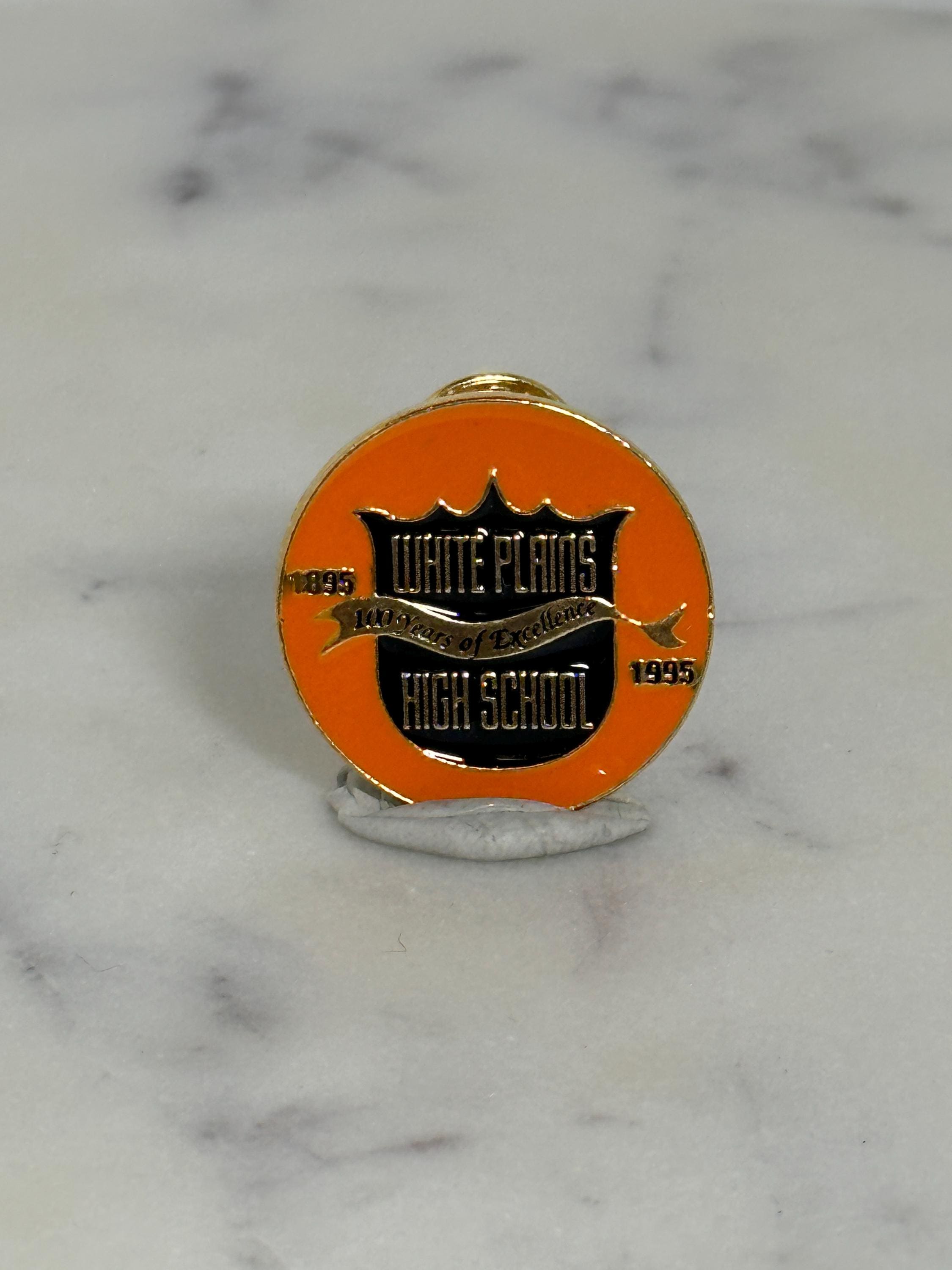 White Plains High School Pin: Orange Enamel Round - 1995 Commemorative Accessory