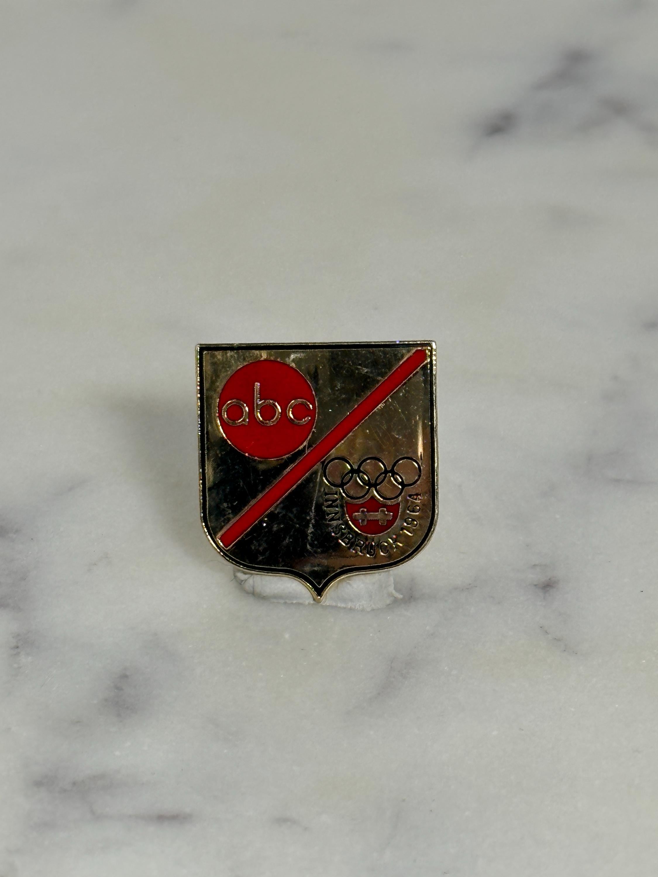 ABC Olympics Enamel Pin: Red & Gold Shield - 1984 Innsbruck Accessory