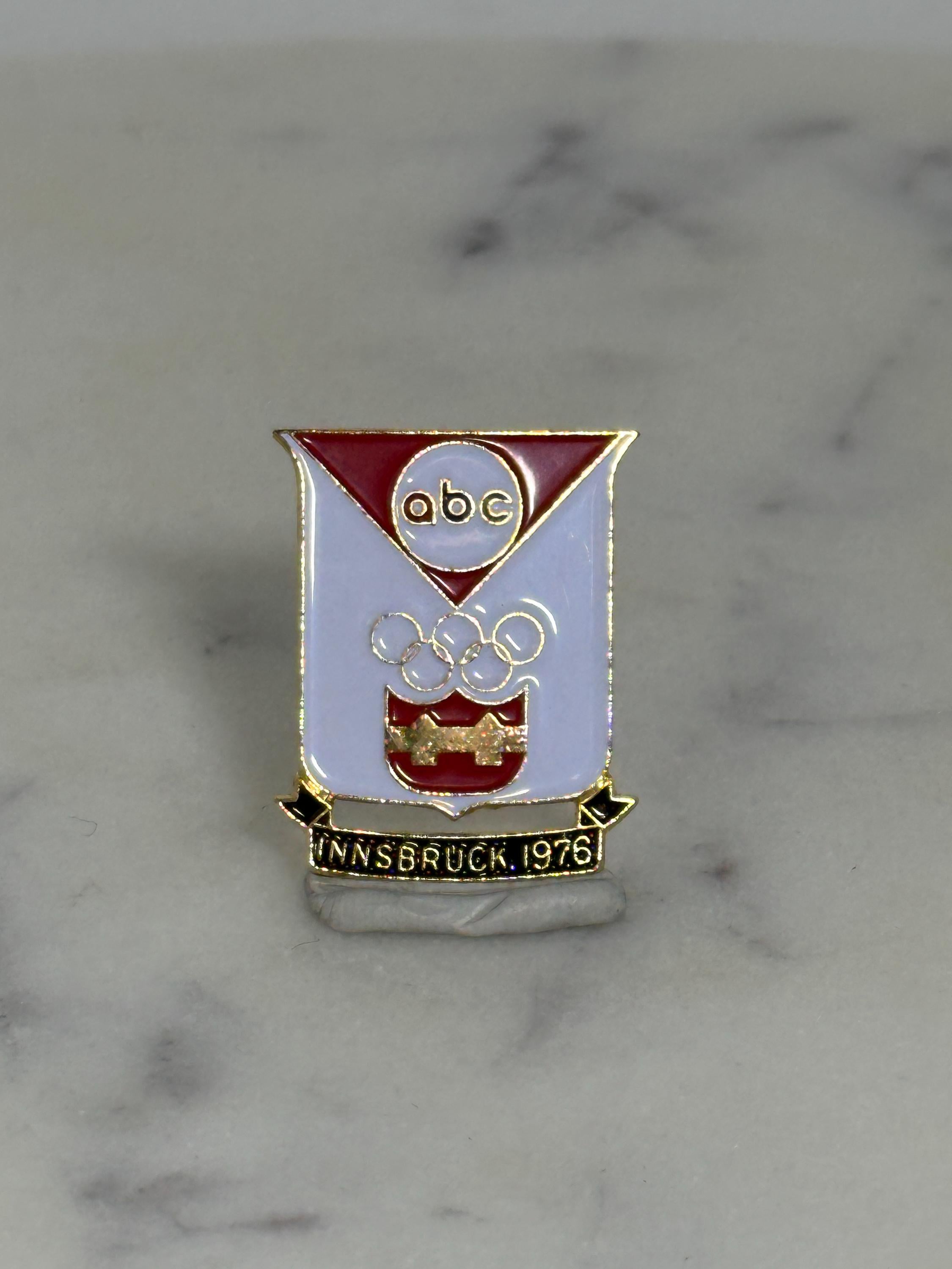1976 Innsbruck Olympics Pin: ABC White Red Enamel - Vintage Sports Accessory