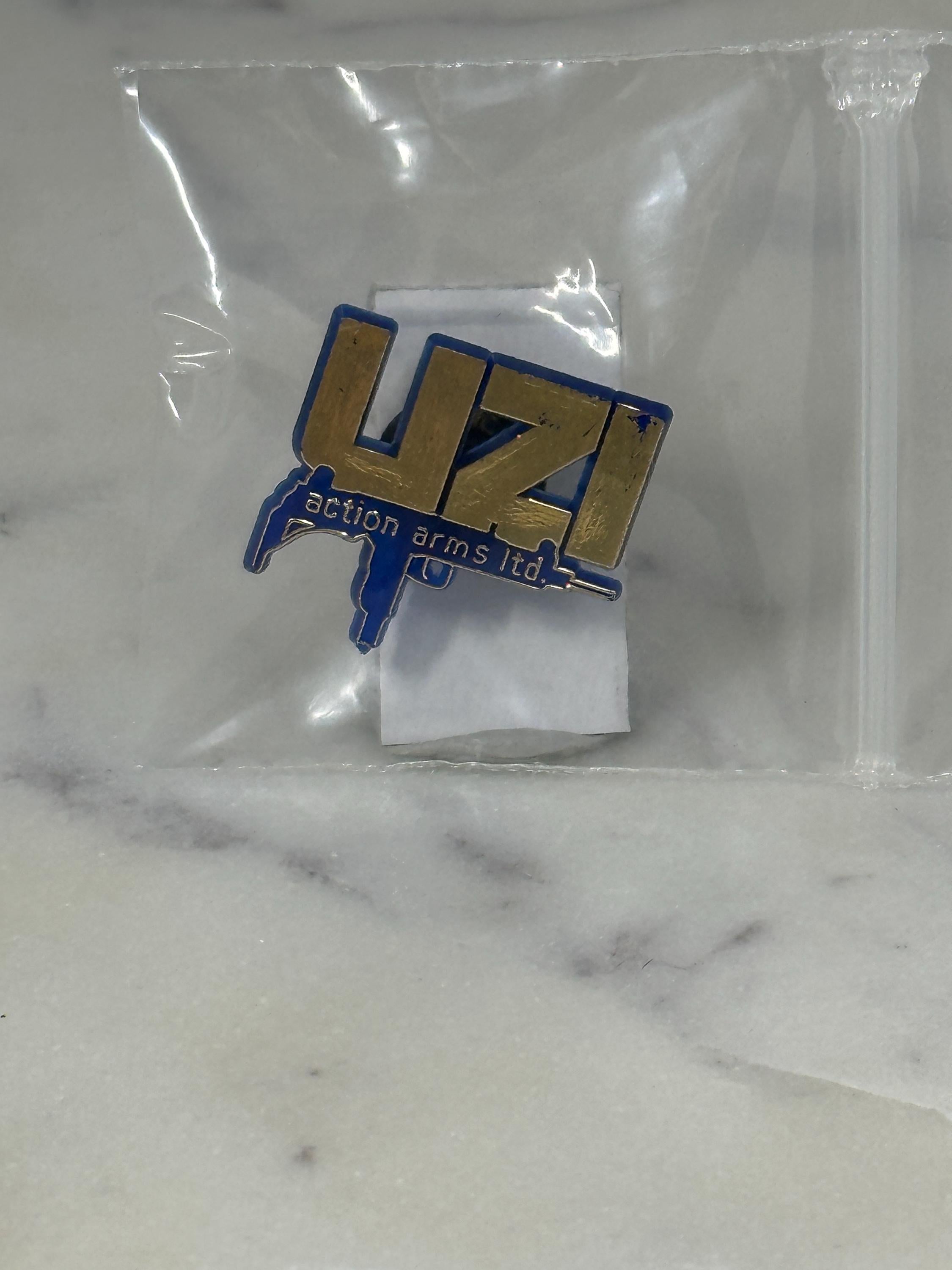 UZI Action Arms Ltd. Enamel Pin: Gold & Blue Logo - 80s Firearm Accessory
