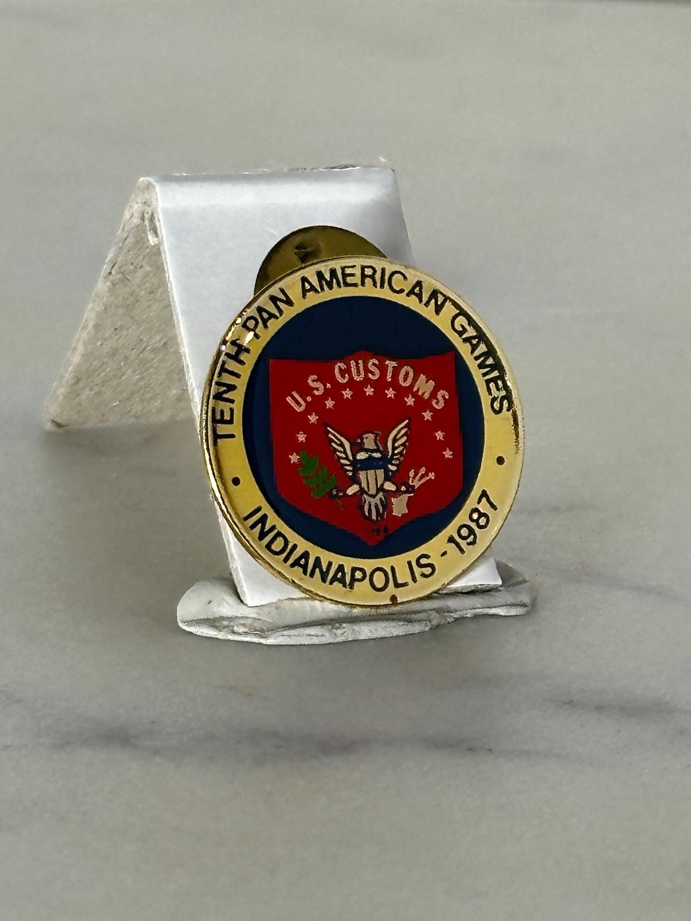 Pan Am Games Enamel Pin: Gold & Red Round - 1987 Sports Accessory
