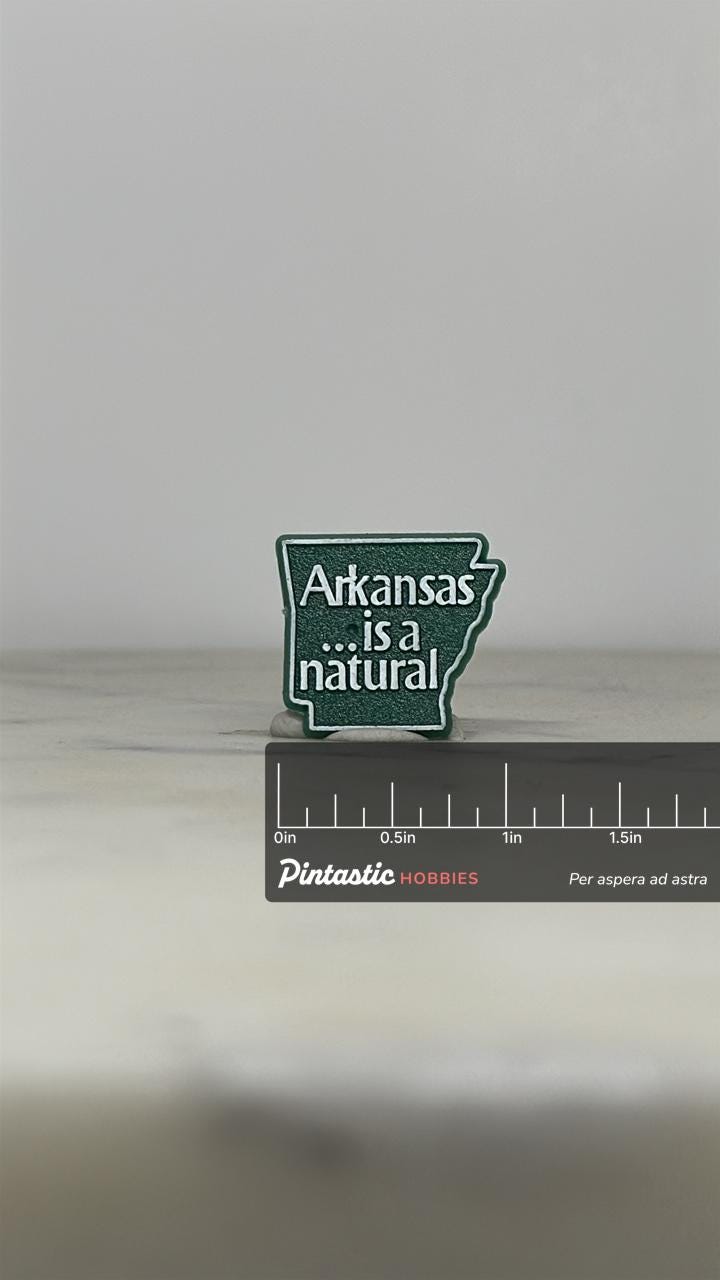 Arkansas State Enamel Pin: Green & White - Vintage Souvenir Accessory with ruler overlay for size reference