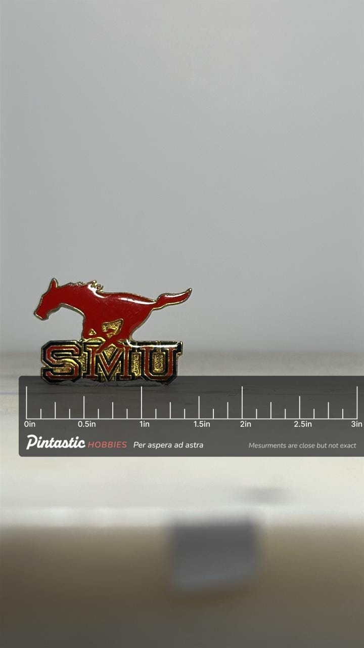 SMU Mustangs Enamel Pin: Red Gold Finish - Collegiate Spirit Accessory with ruler overlay for size reference