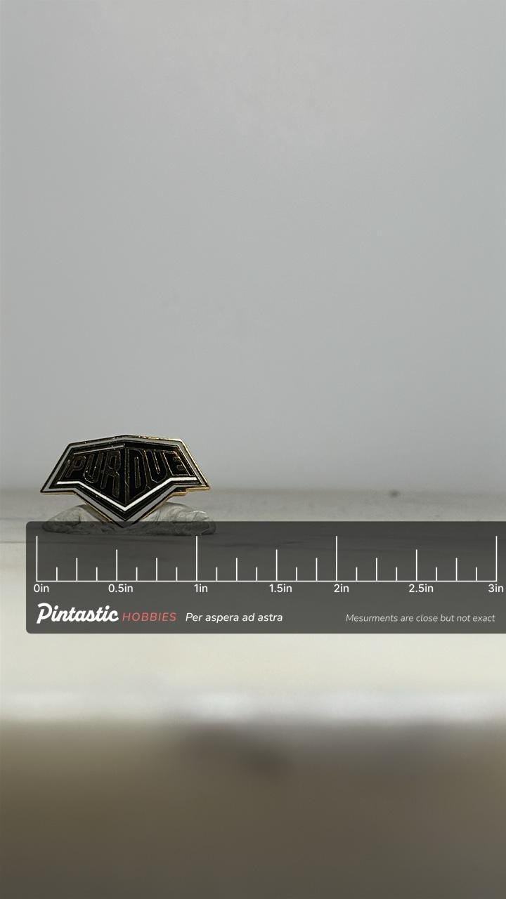 Purdue University Enamel Pin: Black & Gold Shield - Vintage College Accessory with ruler overlay for size reference