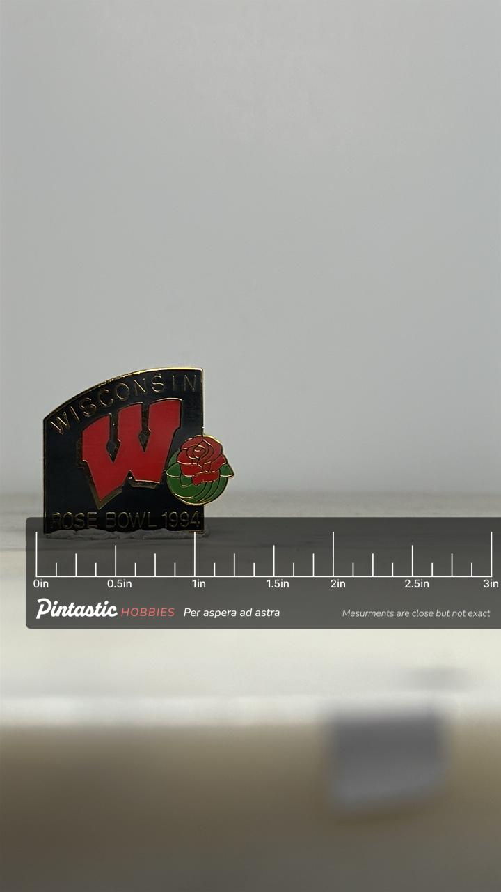 Wisconsin Rose Bowl Pin: Black Red Enamel - 1994 Sports Memorabilia with ruler overlay for size reference