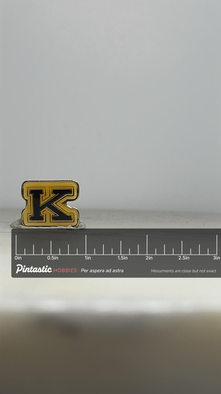 Kent State University Pin: Gold & Black “K” Enamel – Vintage College Lapel Badge with ruler overlay for size reference