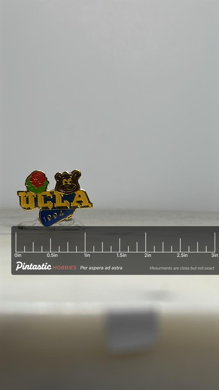 UCLA Rose Bowl Enamel Pin: Gold Blue Finish - 1994 Sports Accessory with ruler overlay for size reference