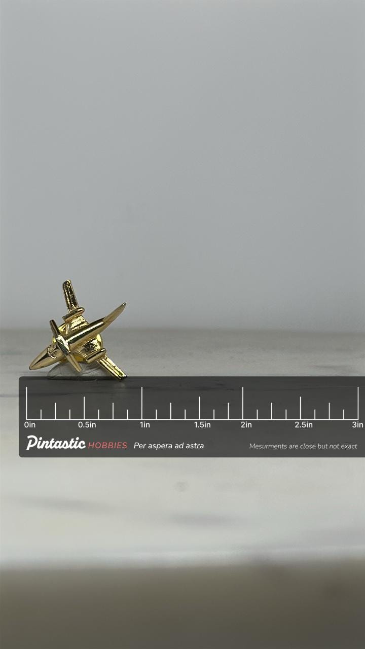 Vintage Fighter Jet Pin: Gold-Tone Aviation Lapel – USAF Style Military Pilot Collectible with ruler overlay for size referen