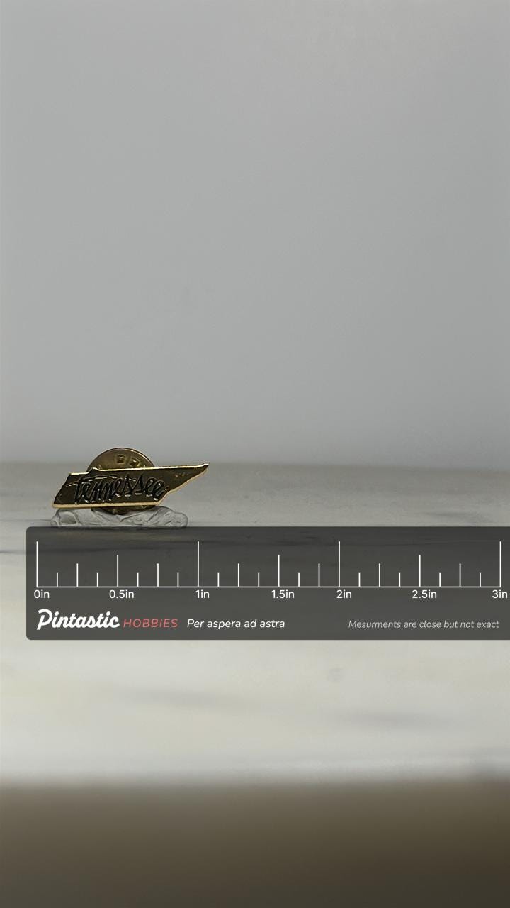Tennessee State Souvenir Pin: Gold Tone Enamel - Retro Travel Accessory with ruler overlay for size reference