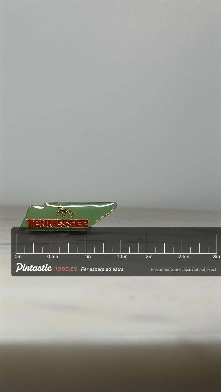 Tennessee State Enamel Pin: Green Red Gold Finish - Vintage Travel Accessory with ruler overlay for size reference