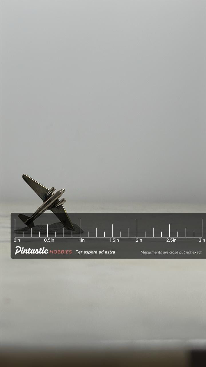 Silver Jet Airplane Pin: Minimalist Metal Finish - Retro Aviation Accessory with ruler overlay for size reference