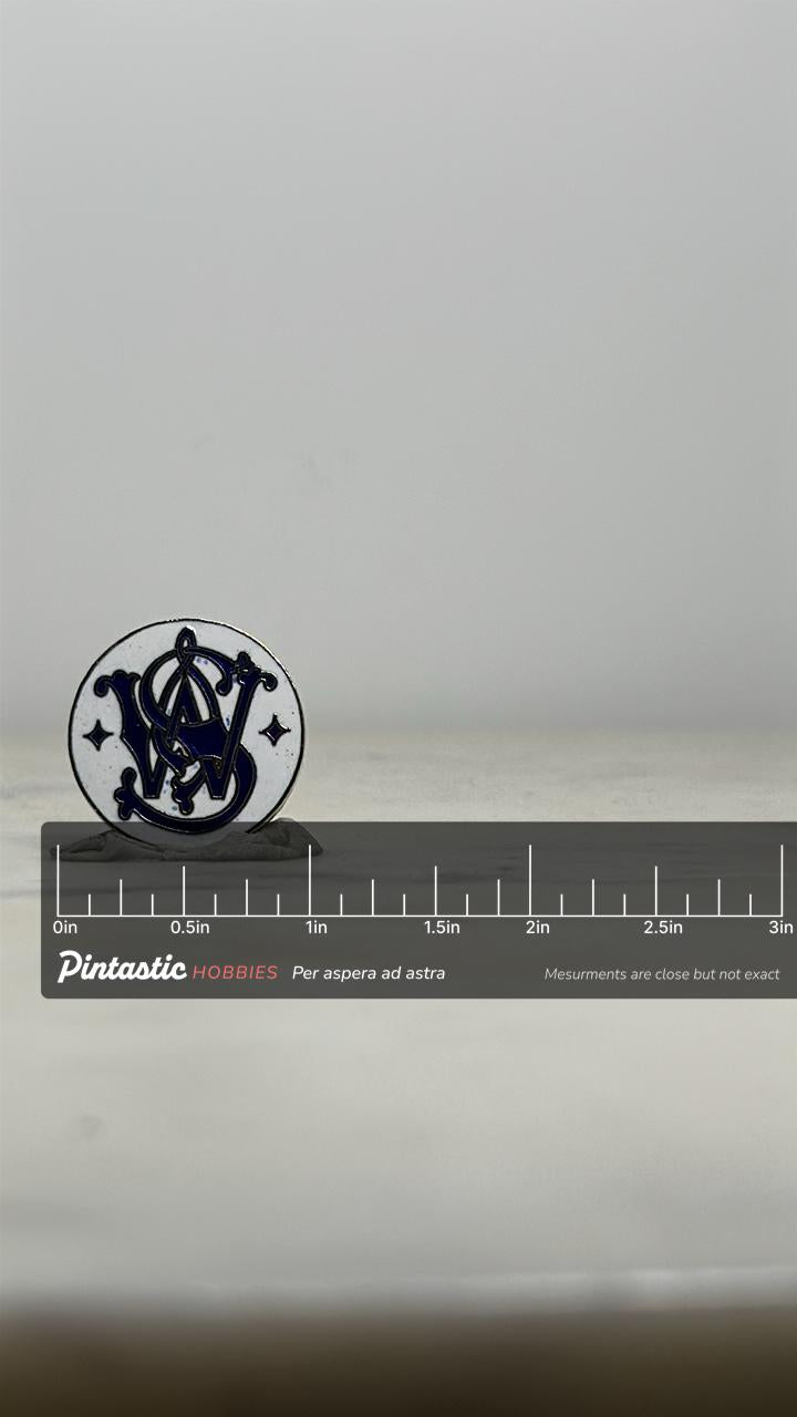 Smith & Wesson Logo Pin: Blue Enamel Round - Vintage Collectible Accessory with ruler overlay for size reference