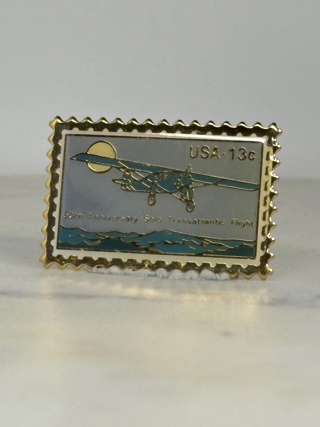 Vintage Airplane Enamel Pin: Goldtone Stamp Shape - Aviation History Accessory