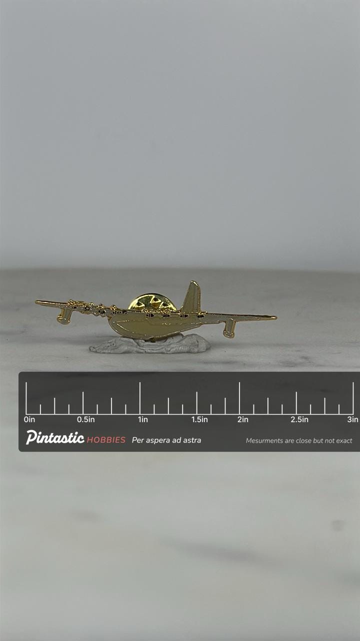 Lockheed C-130 Hercules Plane Pin – Vintage Gold Metal Military Collectible with ruler overlay for size reference