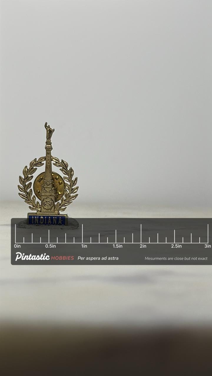 Indiana Monument Souvenir Pin: Silver Enamel Finish - Vintage Travel Accessory with ruler overlay for size reference
