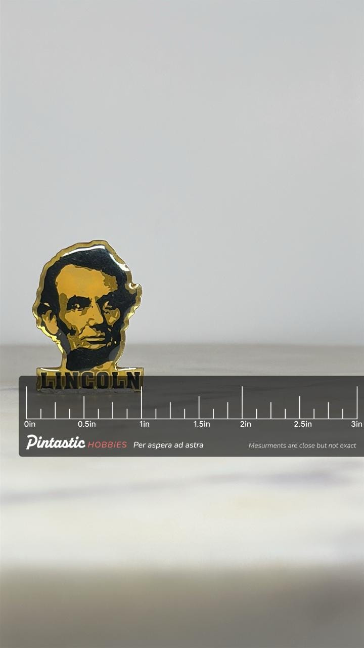 Abraham Lincoln Enamel Pin: Gold Tone Portrait - Patriotic Vintage Accessory with ruler overlay for size reference