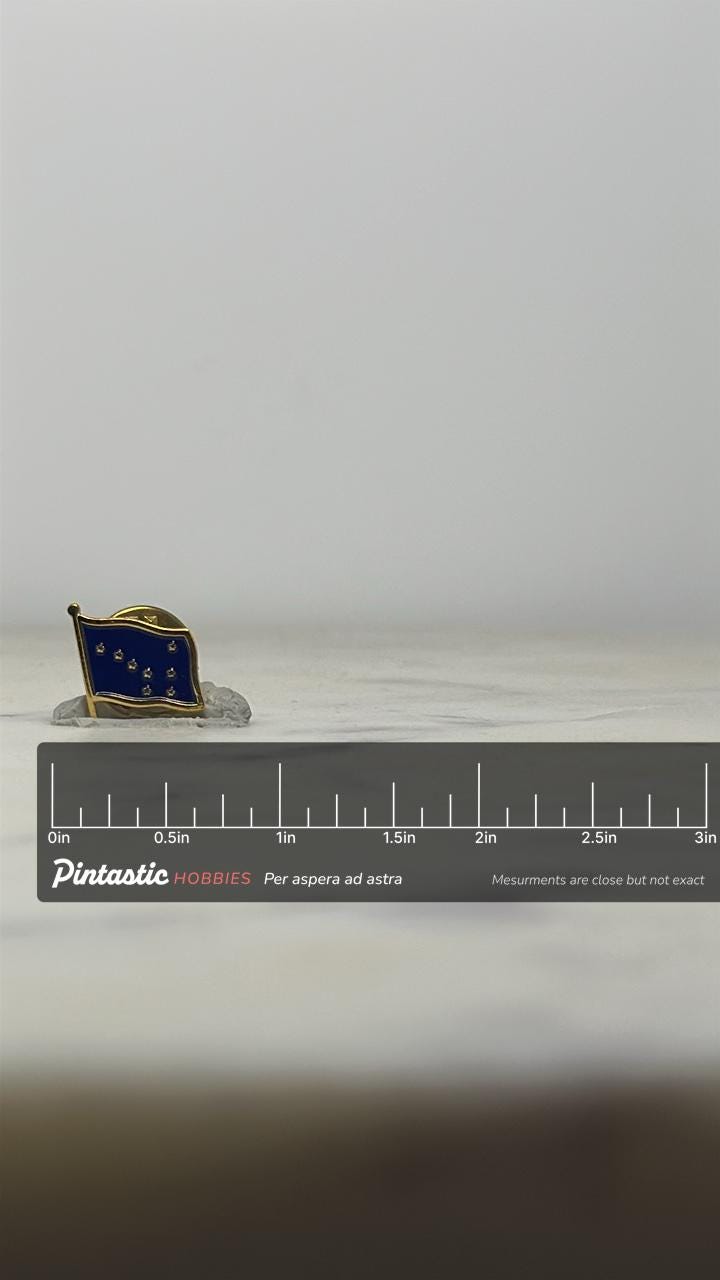 Alaska State Flag Enamel Pin: Gold & Navy Blue - Vintage Travel Accessory with ruler overlay for size reference