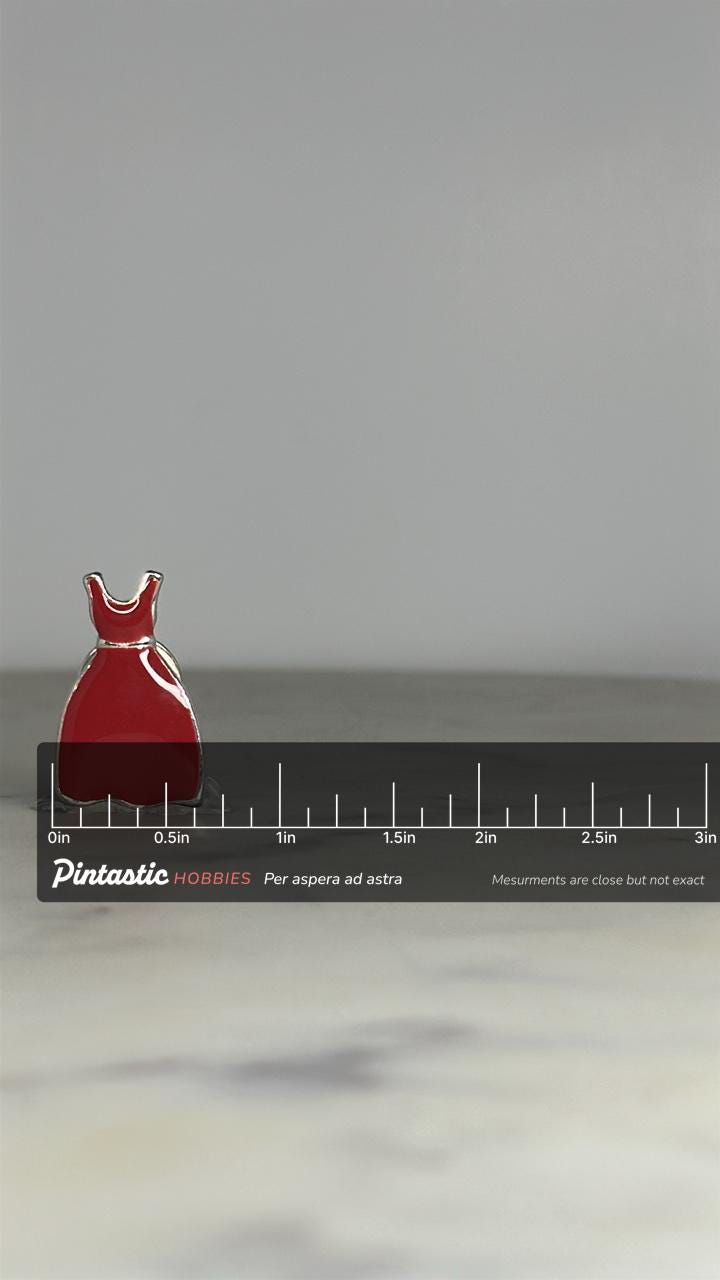 Red Dress Enamel Pin: Glossy Silver Trim - Retro Fashion Accessory with ruler overlay for size reference