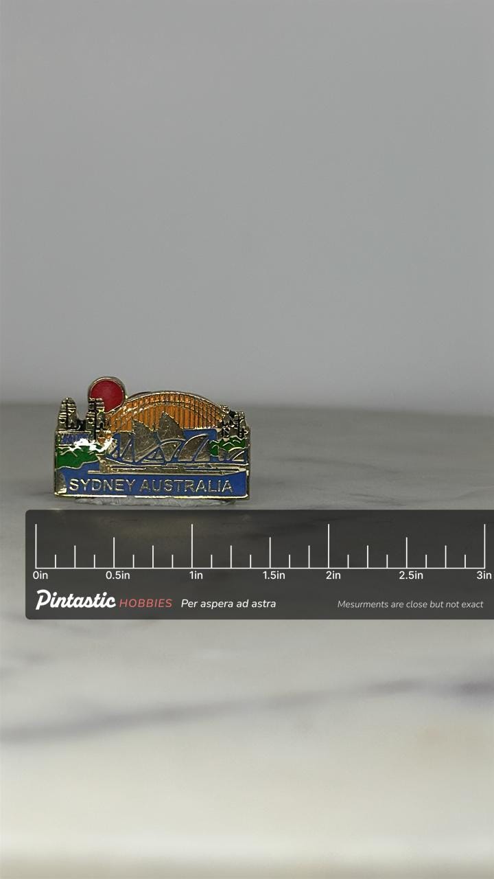 Sydney Australia Souvenir Pin: Gold & Enamel Finish - Travel City Accessory with ruler overlay for size reference