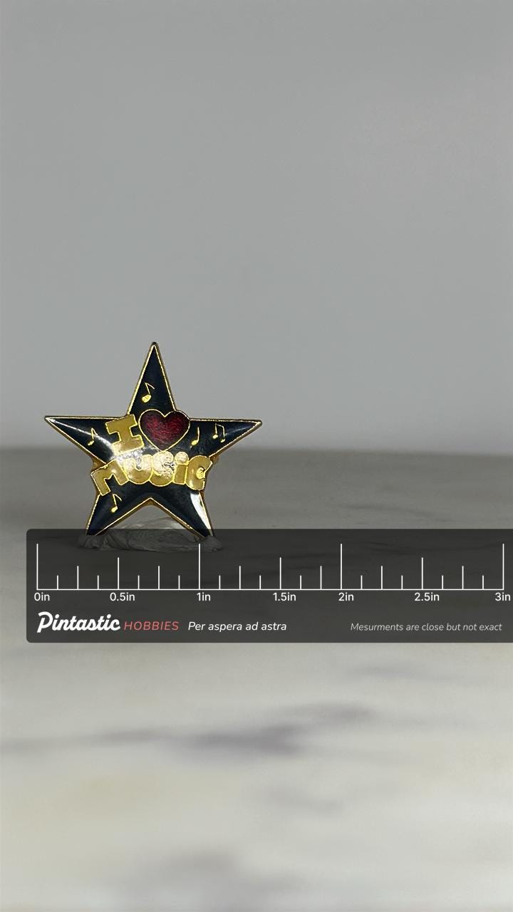 I Love Music Star Pin: Black & Gold Enamel - Retro Music Accessory with ruler overlay for size reference