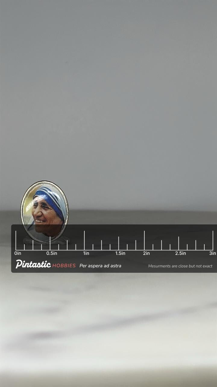 Mother Teresa Portrait Pin: Oval Silver-Tone - Religious Accessory with ruler overlay for size reference