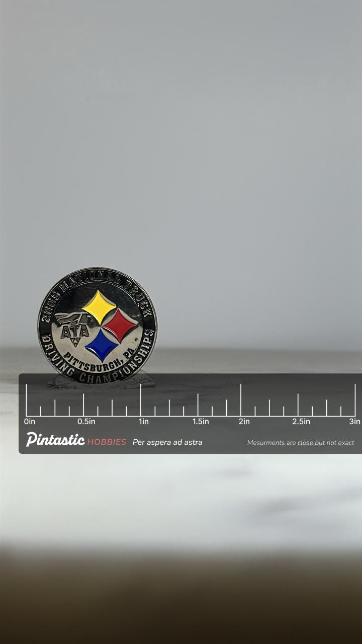 2009 Truck Championship Pin: Silver Enamel Finish - Vintage Event Accessory with ruler overlay for size reference