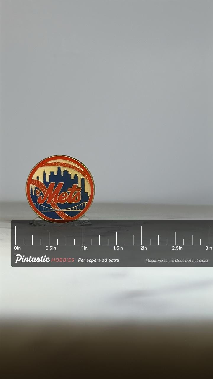 NY Mets Baseball Pin: Orange & Blue Enamel - Vintage Sports Accessory with ruler overlay for size reference