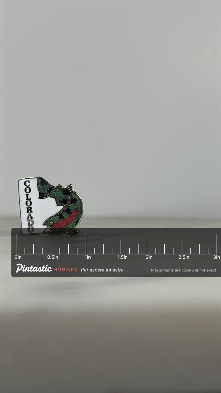 Colorado Trout Enamel Pin: White & Multicolor - Vintage Travel Accessory with ruler overlay for size reference