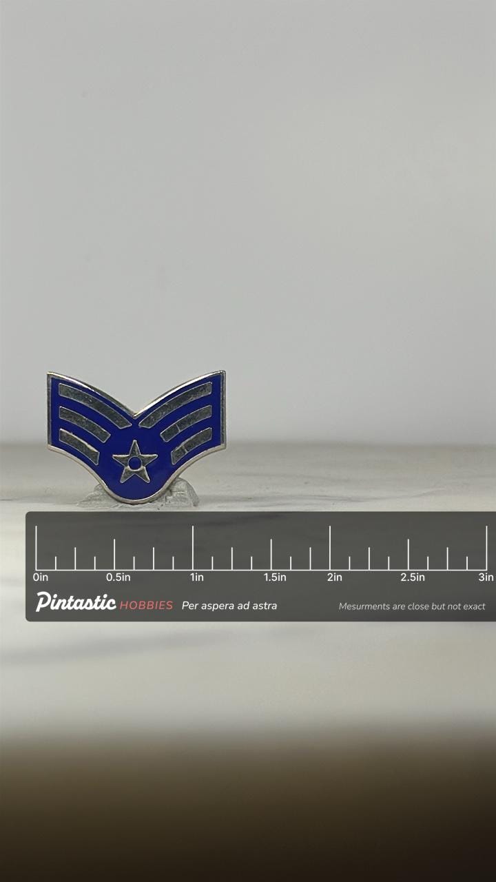 USAF Staff Sergeant Rank Pin: Blue Enamel Silver Trim - Military Accessory with ruler overlay for size reference