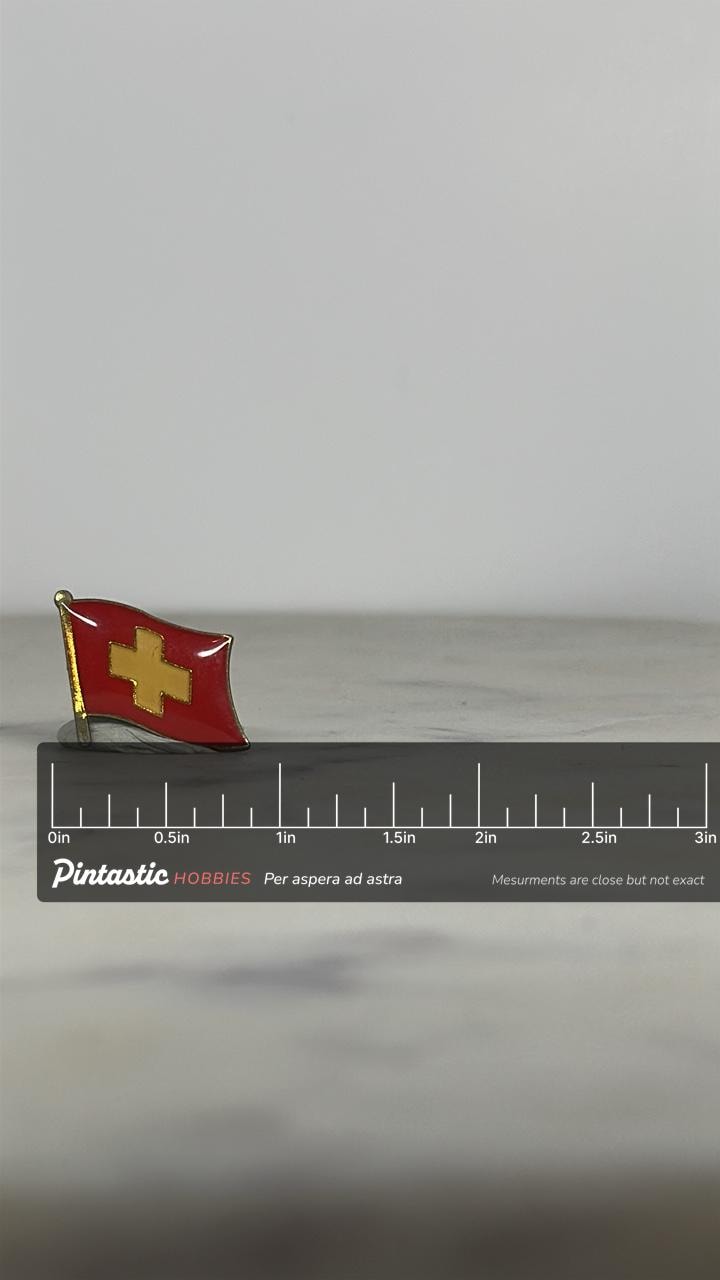 Switzerland Flag Enamel Pin: Red & Gold Cloisonné - Vintage Travel Accessory with ruler overlay for size reference
