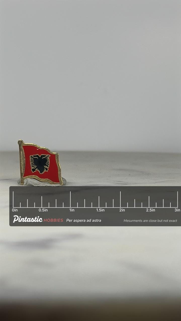 Albania Flag Enamel Pin: Red & Black Gold Trim - Patriotic Accessory with ruler overlay for size reference