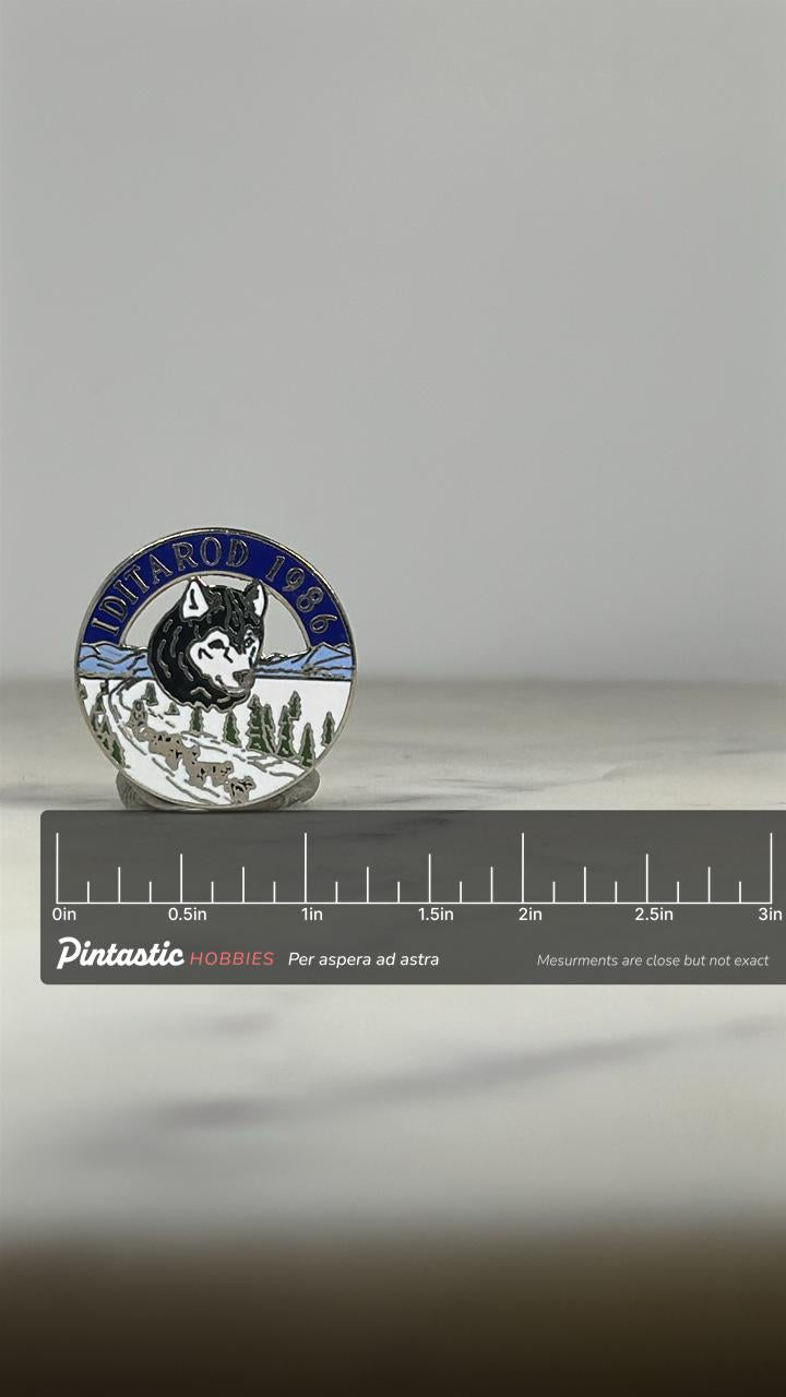 Iditarod 1986 Alaska Pin: Husky Dog Sled Finish - Vintage Sports Accessory with ruler overlay for size reference