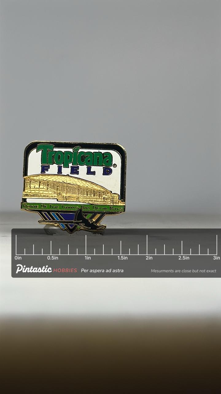 Tropicana Field Enamel Pin: Gold & Multicolor Stadium - 1990s Sports Accessory with ruler overlay for size reference