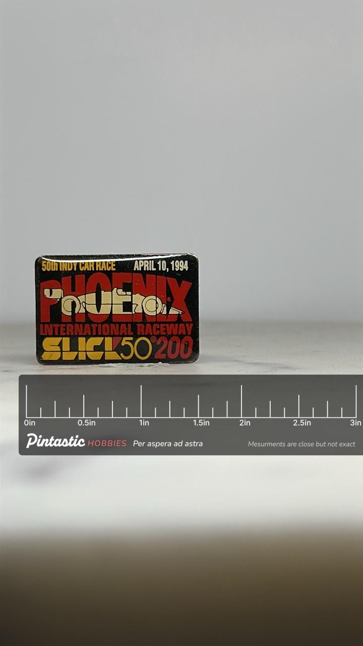 Phoenix Raceway Racing Pin: Black Enamel Finish - 1994 IndyCar Accessory with ruler overlay for size reference
