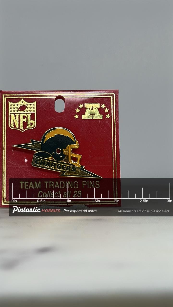 NFL Chargers Enamel Pin: Gold & Navy Helmet - Vintage Sports Accessory with ruler overlay for size reference
