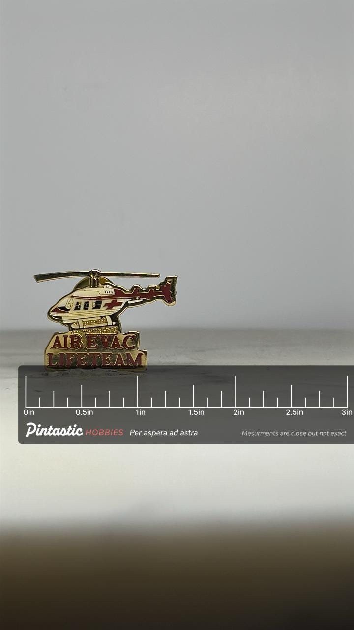 Air Evac Lifeteam Helicopter Pin: Gold Red Enamel - Medical Service Accessory with ruler overlay for size reference