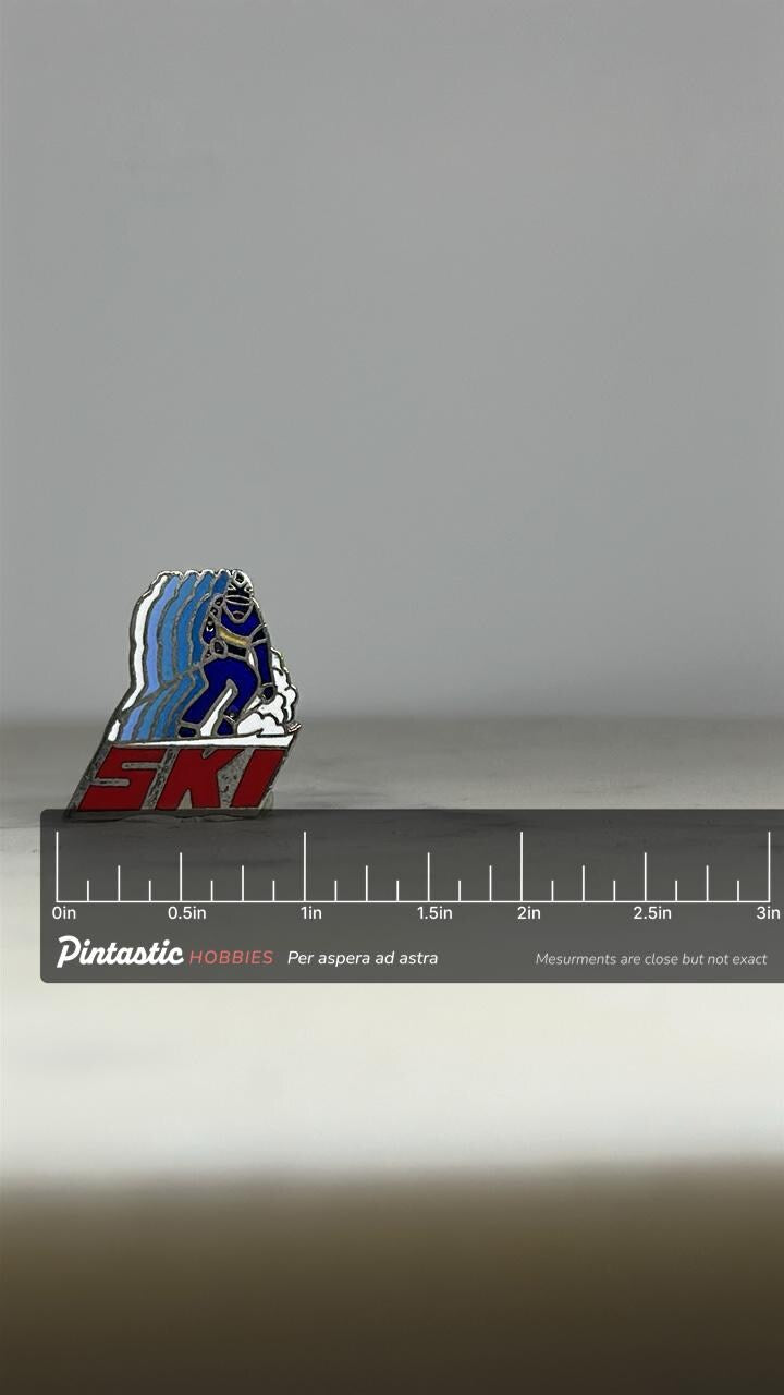 Skiing Enamel Pin: Blue & Red Retro Style - Vintage Winter Accessory with ruler overlay for size reference