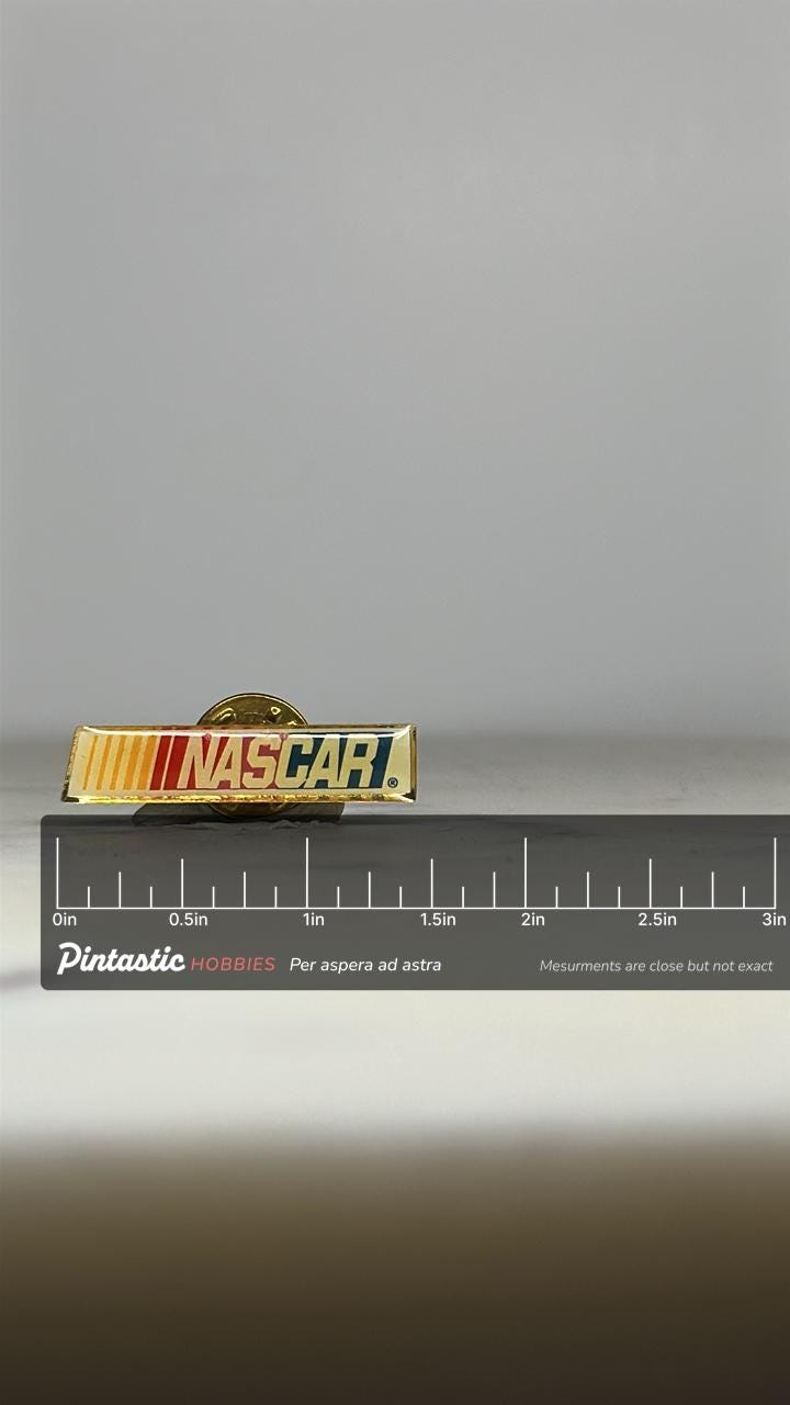 NASCAR Logo Enamel Pin: Red Yellow Blue Stripe - Vintage Racing Accessory with ruler overlay for size reference