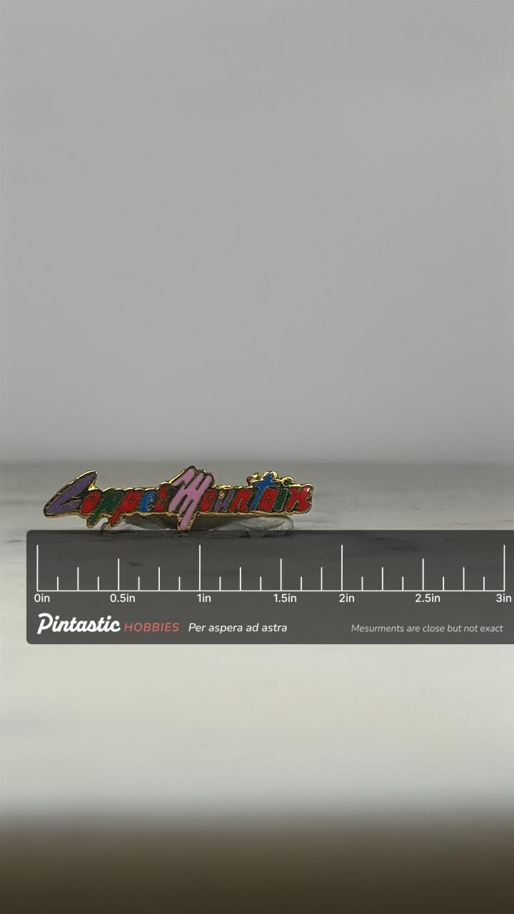 Copper Mountain Enamel Pin: Multicolor Script - Retro Ski Resort Accessory with ruler overlay for size reference