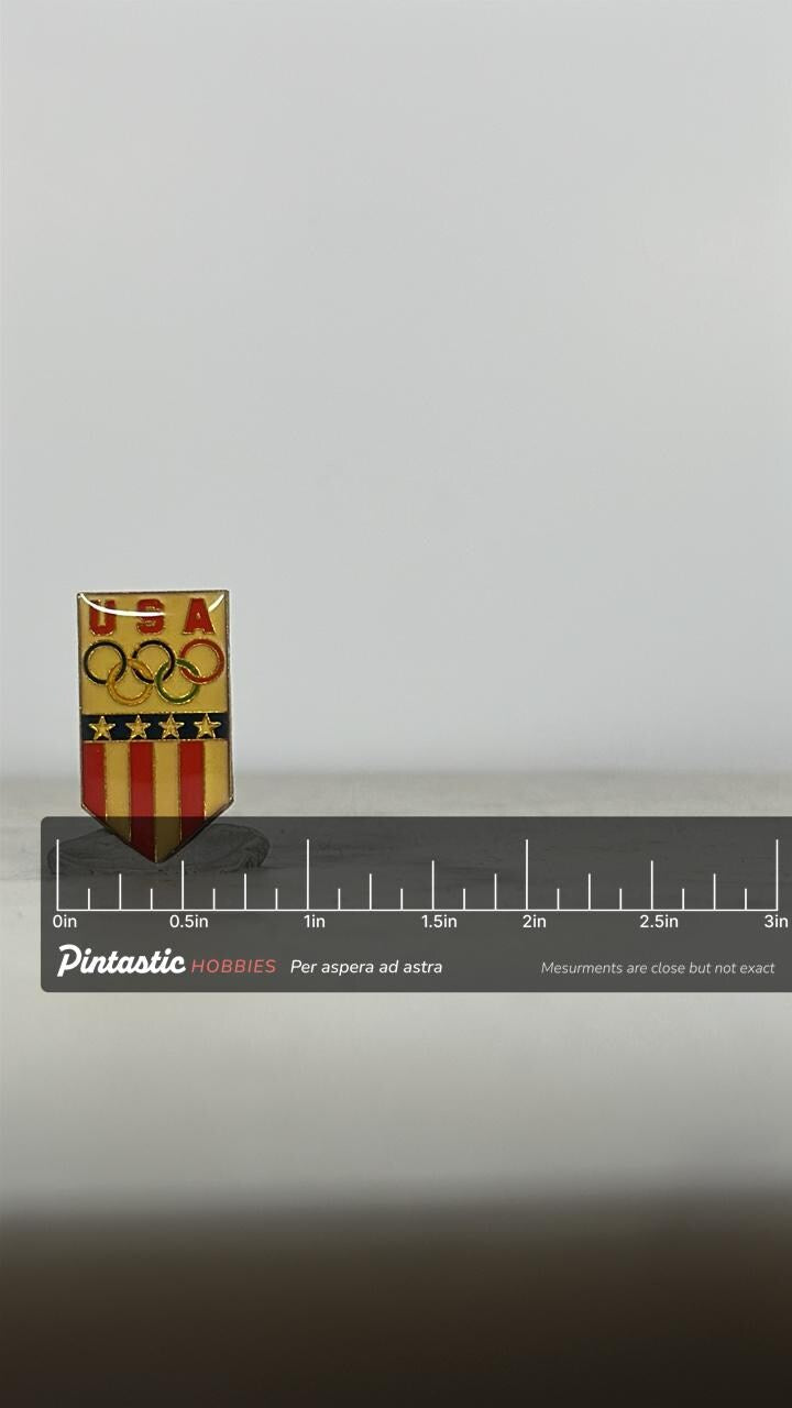 USA Olympic Shield Pin: Red Gold Enamel - Vintage Sports Accessory with ruler overlay for size reference