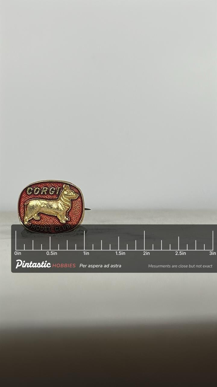 Corgi Model Club Enamel Pin: Gold on Red - Vintage Collectible Accessory with ruler overlay for size reference