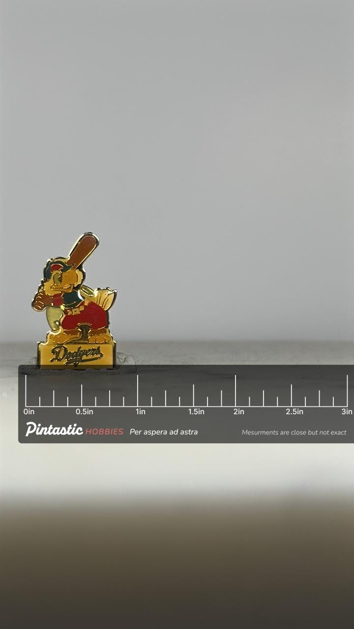 Dodgers Baseball Enamel Pin: Cartoon Parrot Design - Vintage Sports Accessory with ruler overlay for size reference