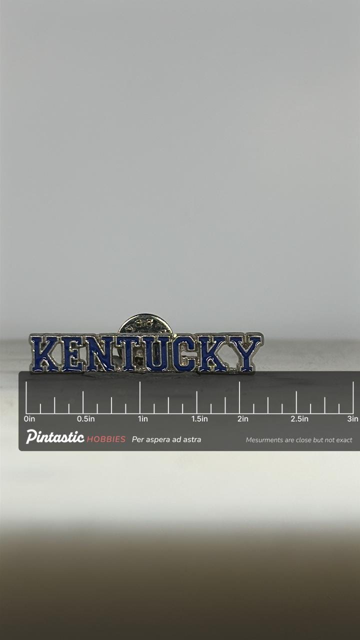 Kentucky Souvenir Pin: Blue Enamel Lettering - Vintage State Accessory with ruler overlay for size reference