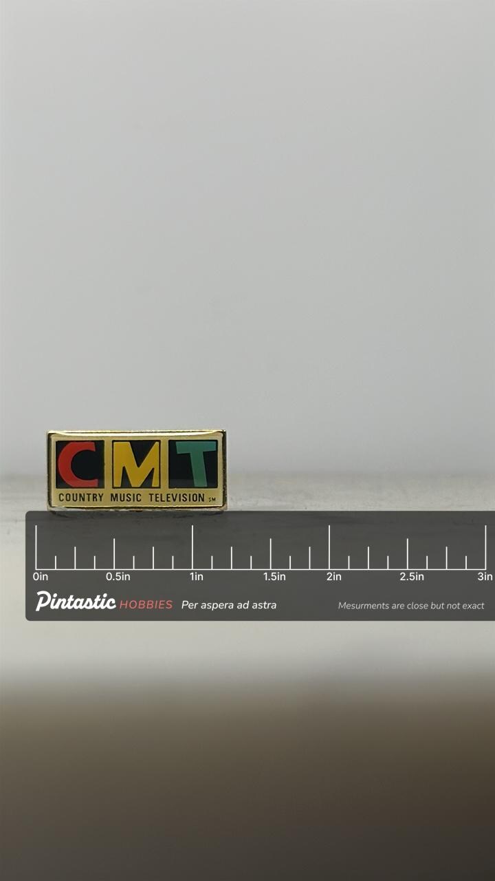 CMT Enamel Pin: Bold Color Block Logo - Vintage Music Accessory with ruler overlay for size reference