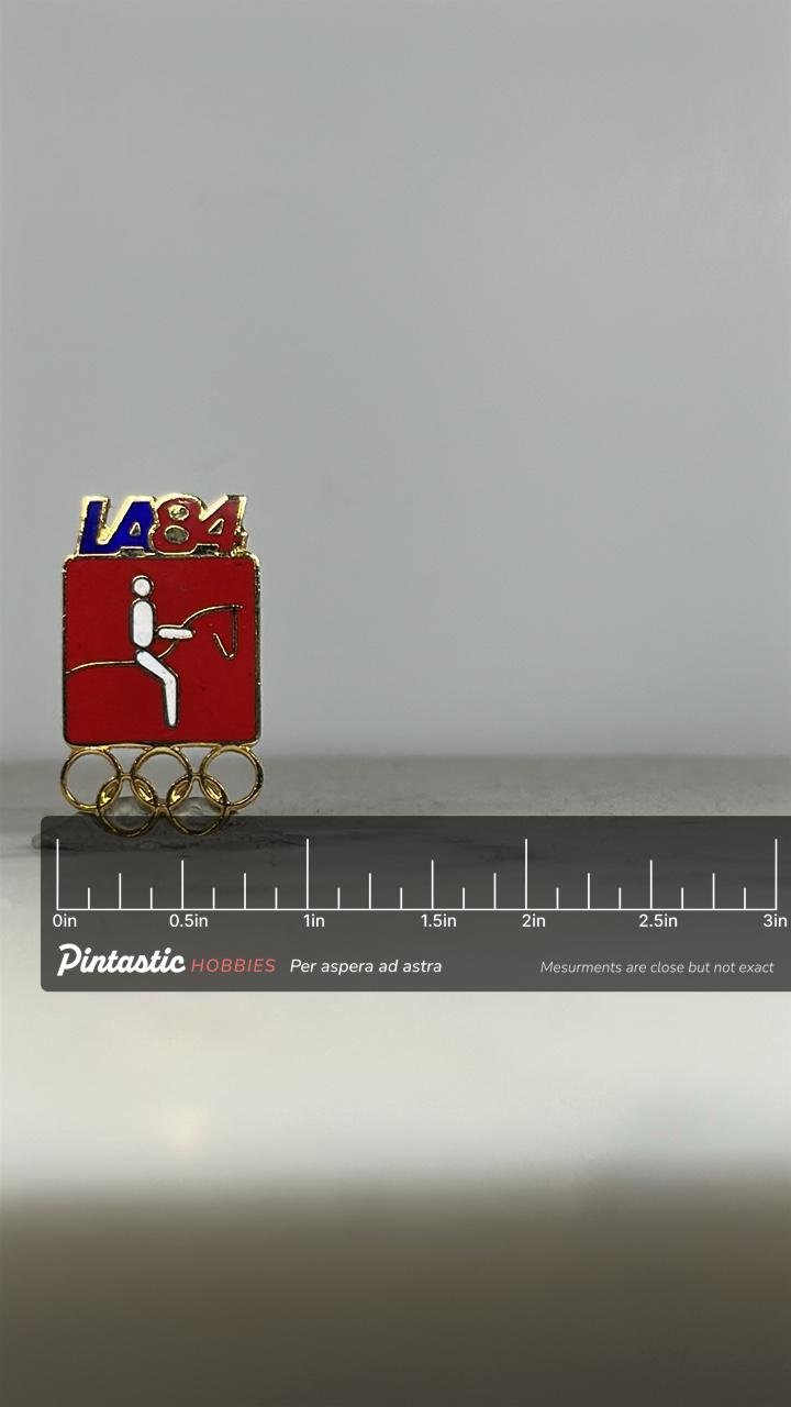 LA84 Olympic Equestrian Pin: Red Gold Enamel - 1984 Sports Accessory with ruler overlay for size reference