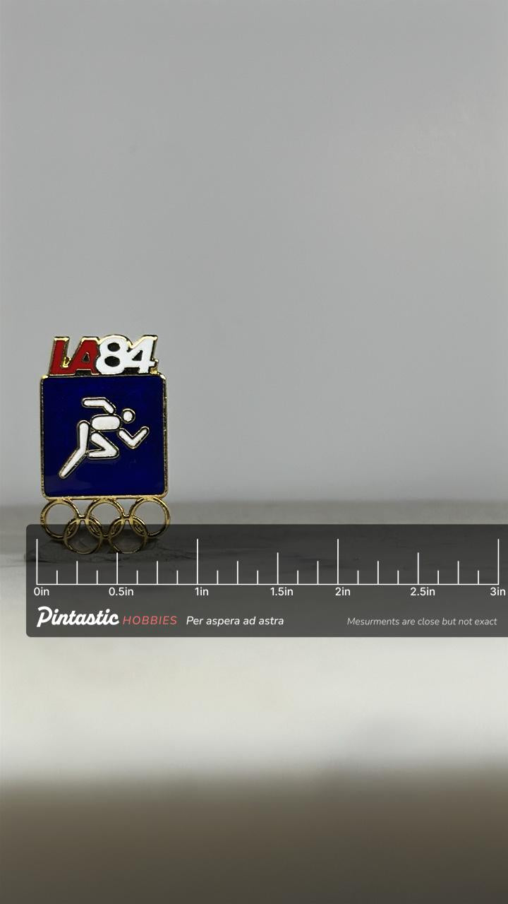 LA 1984 Olympics Running Pin: Blue Enamel Gold Finish - Vintage Sports Accessory with ruler overlay for size reference